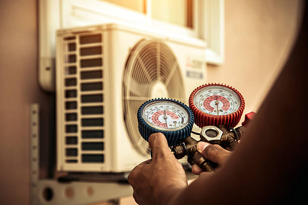 Professional Air Conditioning Service technician working in Laguna Woods, CA